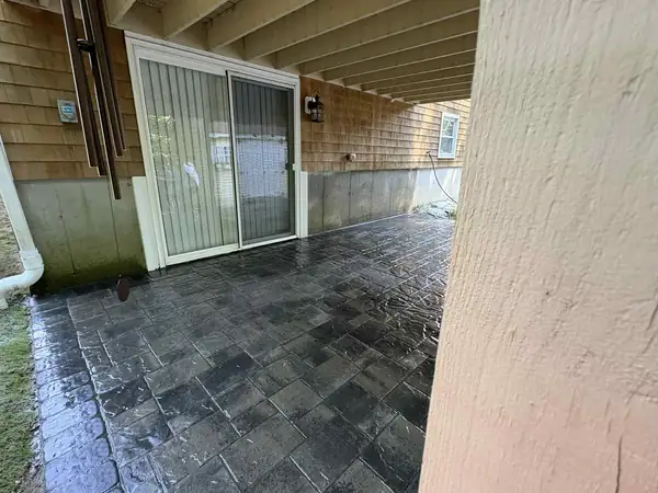 Paver patio under a deck